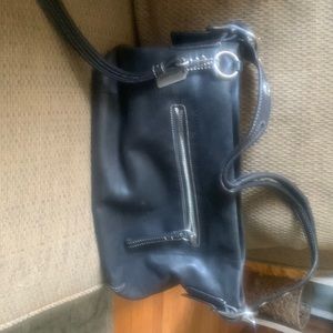 Selling a used coach black leather shoulder bag,good condition